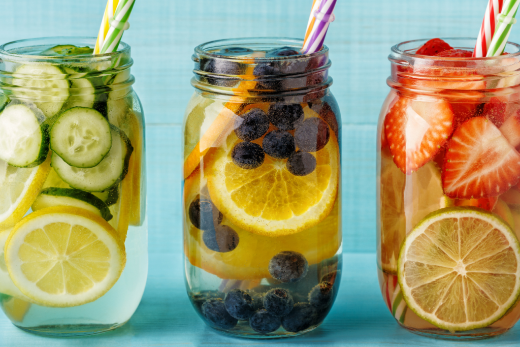 Water in mason jars infused with fruit for hydration